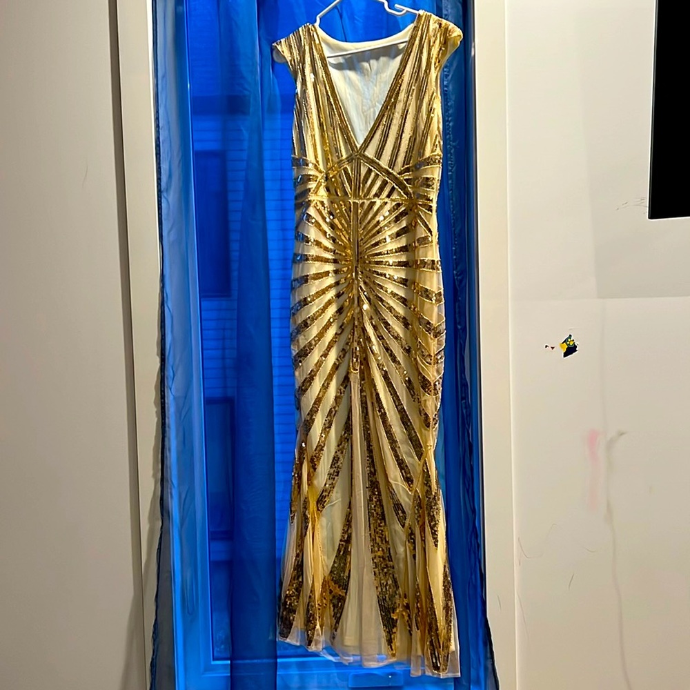 Long sleeve gold and cream dress for festive activities
